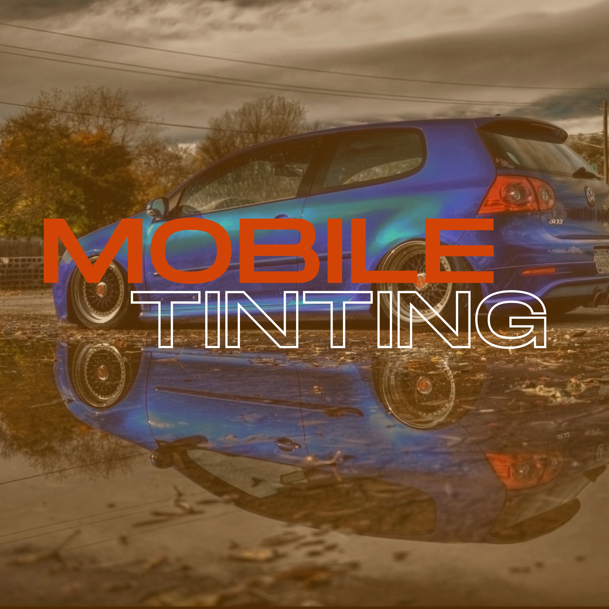 alt="Hatchback car with untinted factory windows before mobile window tinting service"