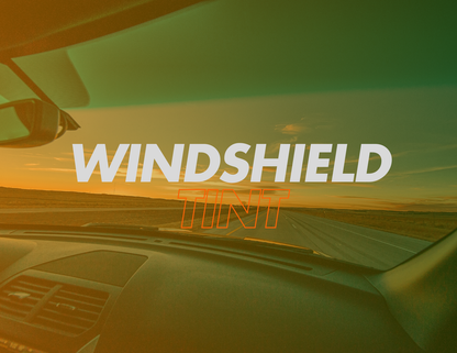 alt="Commercial truck with front windshield tint for glare reduction and UV protection"