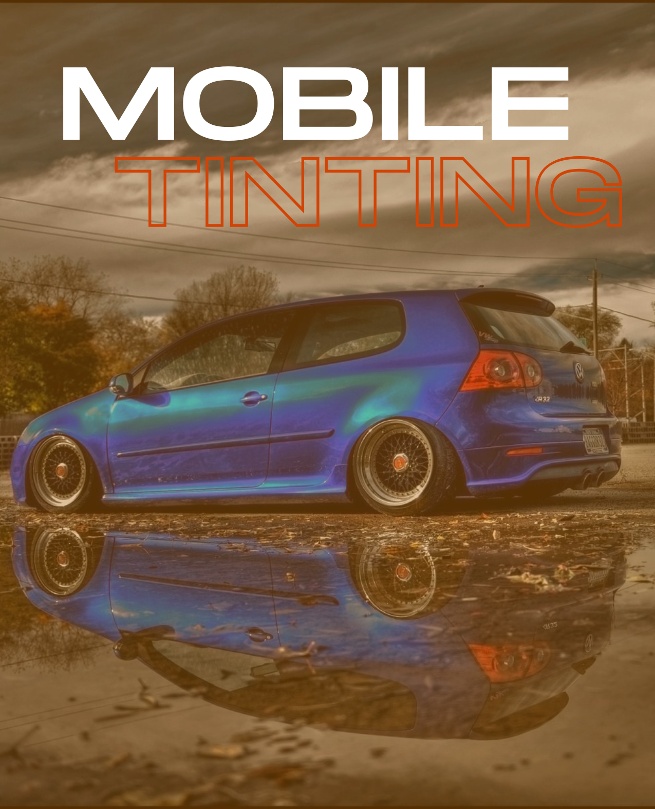 alt="Hatchback car with untinted factory windows before mobile window tinting service"